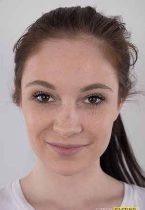 Sexy curly brunette Lana Kendrick plays with her seductive big boobies